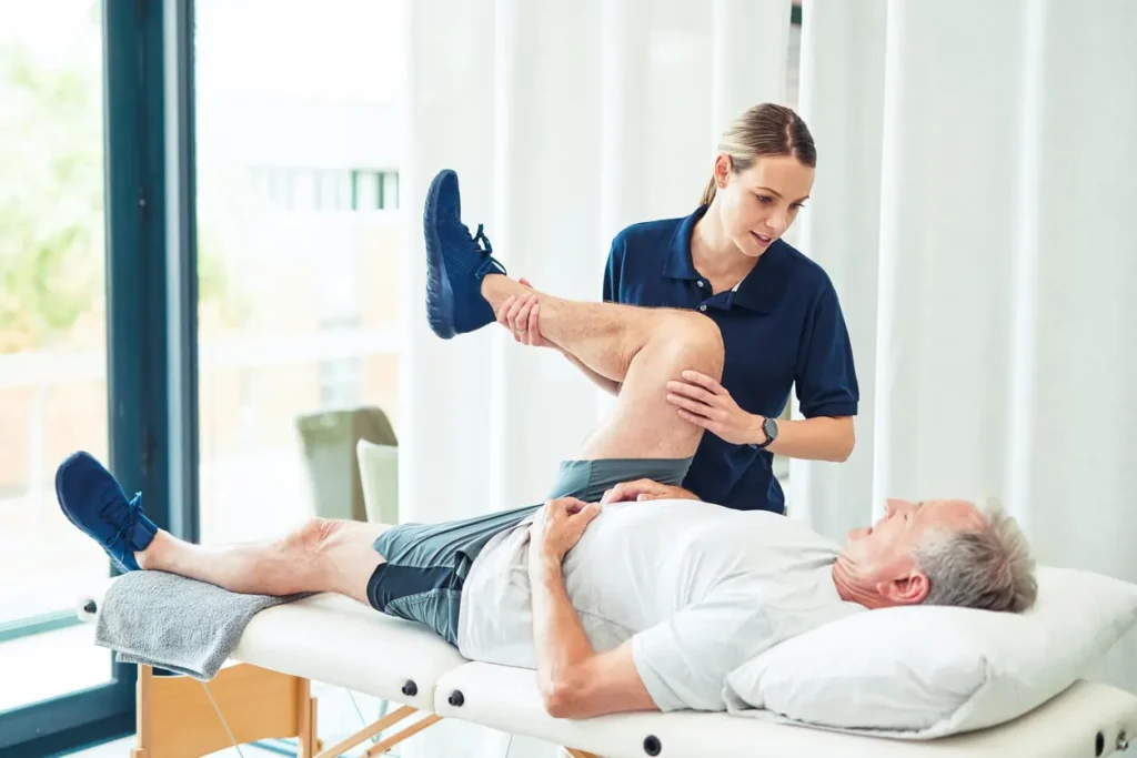 Revitalising Recovery: Effective Rehabilitation Strategies for Muscle Injuries 3 Physiotherapist assisting a patient with muscle recovery exercises Worthing